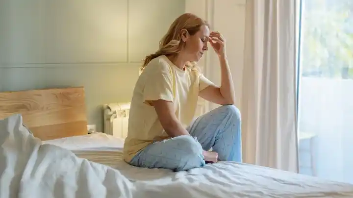 person resting but feeling guilty and unproductive