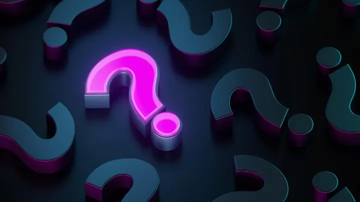 Glowing pink question mark surrounded by dark background symbolizing riddles and mystery.